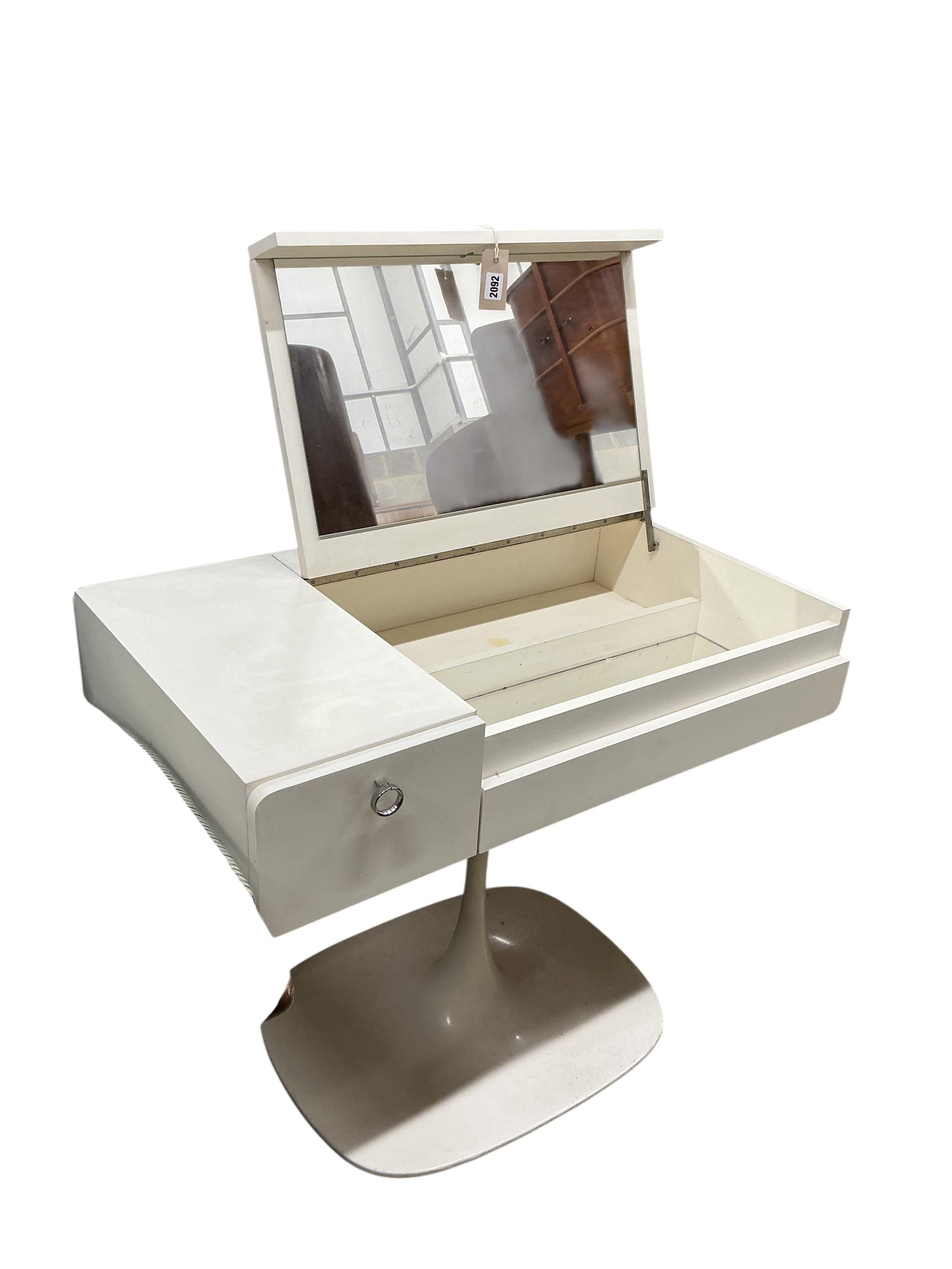 A 1960’s white tulip base dressing table, width 84cm, depth 48cm, height 66cm